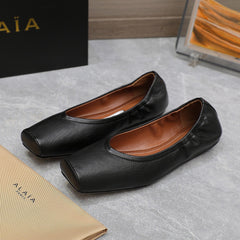 ALAIA BALLET FLATS IN BLACK SMOOTH CALFSKIN