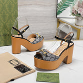 GG HORSEBIT WEDGE SANDAL IN BLACK MONOGRAM JACQUARD FABRIC AND SHEEPSKIN LINING