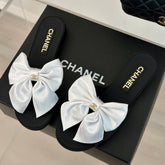 Double CC big bow flat sandals Sheepskin White Black