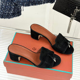 HIGH HEELS IN BLACK SUEDE AND LAMBSKIN