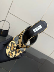 ALAIA HEELED THONG 25S IN LEOPARD PONY HAIR LEATHER