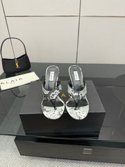 ALAIA HEELED THONG 25S IN WHITE AND BLACK LAMBSKIN SNAKE-EMBOSSED