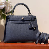 KELLY SELLIER 25 BAG IN PRUSSIAN BLUE OSTRICH LEATHER WITH GOLD HARDWARE