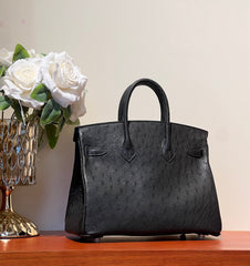 KELLY SELLIER 25 BAG IN BLACK OSTRICH LEATHER WITH GOLD HARDWARE