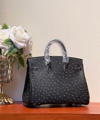 KELLY SELLIER 25 BAG IN BLACK OSTRICH LEATHER WITH WHITE RHINSTONES