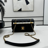 CHANEL 25S FLAP BAG 23 CM IN BLACK LAMBSKIN WITH PEARL TOP HANDLE