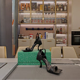 OPEN-TOE CURVED HIGH HEEL SANDALS IN BLACK SMOOTH CALFSKIN