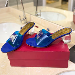 HIGH MULE 60MM IN COBALT BLUE SHEEPSKIN AND TRANSPARENT PVC