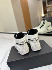 MID-TOP SNEAKERS IN WHITE AND BLACK TRIM PERFORATED LAMBSKIN