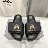 SLIDE SANDALS IN BLACK NYLON AND RUBBER YELLOW PRINT