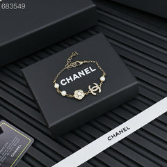 CC BRACELET 25P IN GOLD METAL PEARLY WHITE AND CRYSTAL