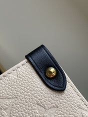 CRAFTY ONTHEGO GM 41 CREME BLACK MONOGRAM GIANT CANVAS