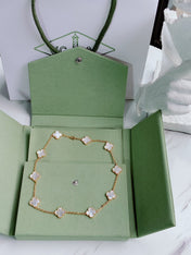 VINTAGE MOP NECKLACE 10 MOTIFS GOLD