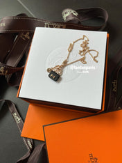 CONSTANCE BLACK PEDANT PINK GOLD NECKLACE