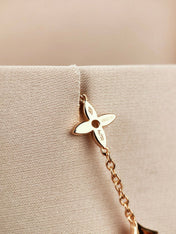 STAR AND SUN 7 MOTIFS GOLD BRACELET