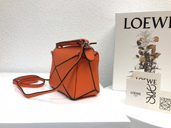 LOE MINI 18 PUZZLE BAG IN VIVID ORANGE CALFSKIN