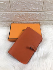 HM DOGON WALLET 20 ORANGE GRAINED CALFSKIN