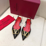 VLOGO SIGNATURE BLACK CALFSKIN FLAT SLINGBACK PUMP WITH GOLD LOGO