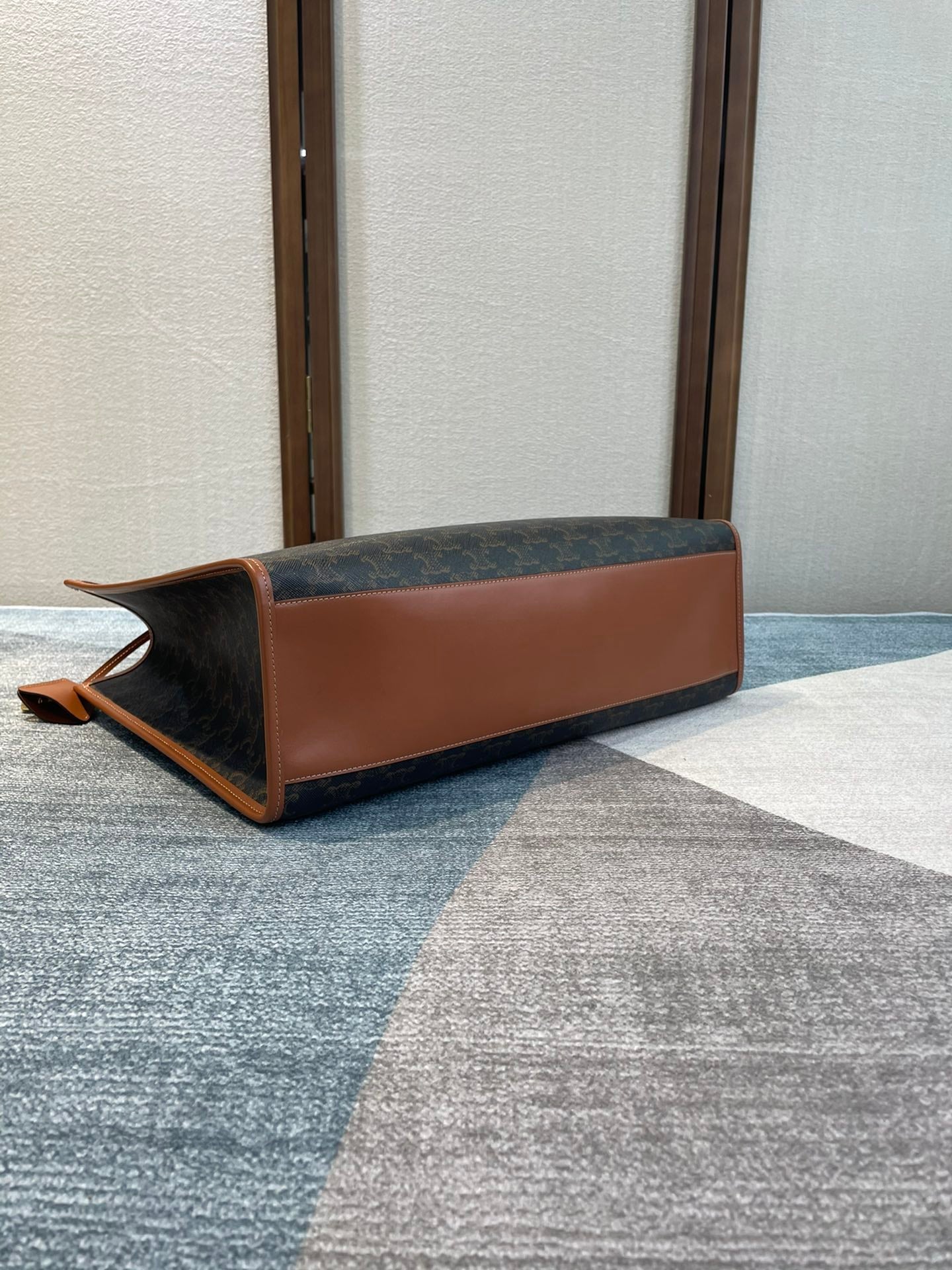 CELINE 25S HORIZONTAL CABAS 43MM IN BLACK TRIOMPHE CANVAS AND TAN BROWN CALFSKIN