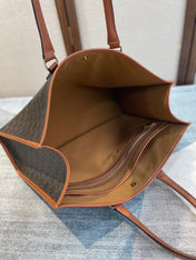 CELINE 25S HORIZONTAL CABAS 43MM IN BLACK TRIOMPHE CANVAS AND TAN BROWN CALFSKIN