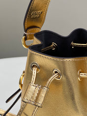 MON TRESOR 18 IN GOLD METALLIC CALFSKIN