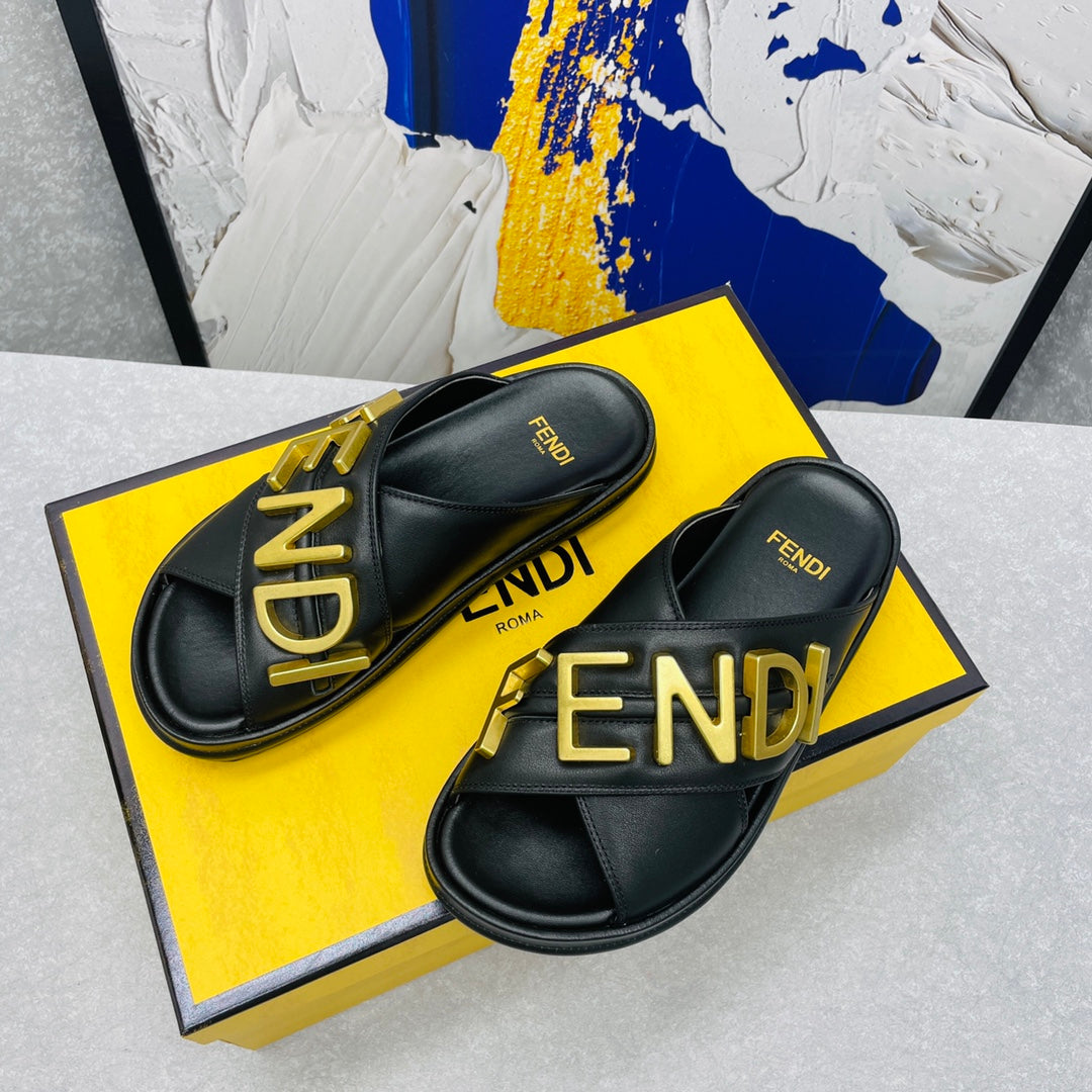 FENDI GRAPHY LOGO LETTERING SLIDES IN BLACK LAMBSKIN WITH GOLD HARDWARE