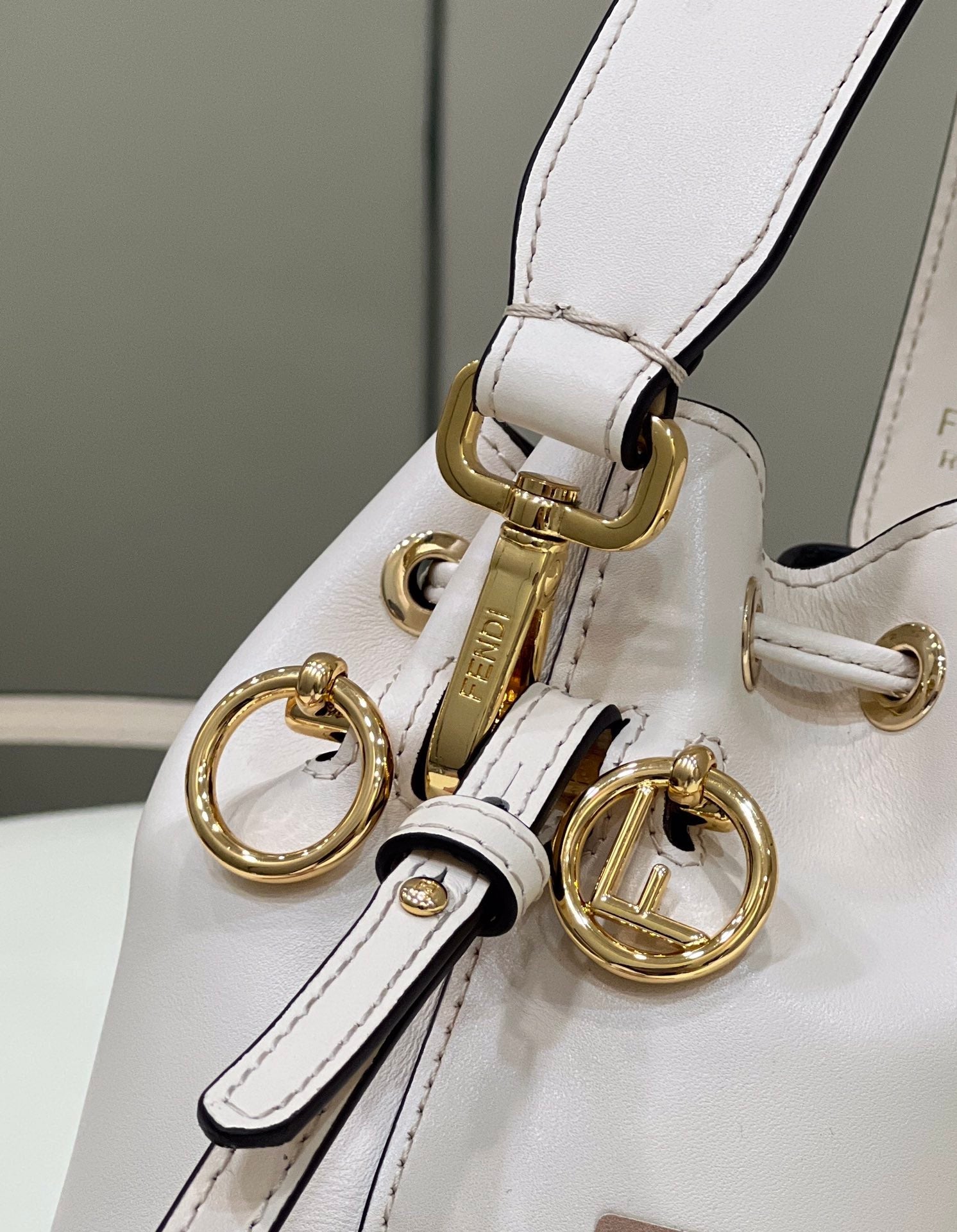 MON TRESOR MINI 18 BAG IN WHITE CALFSKIN FF WITH GOLD HARDWARE