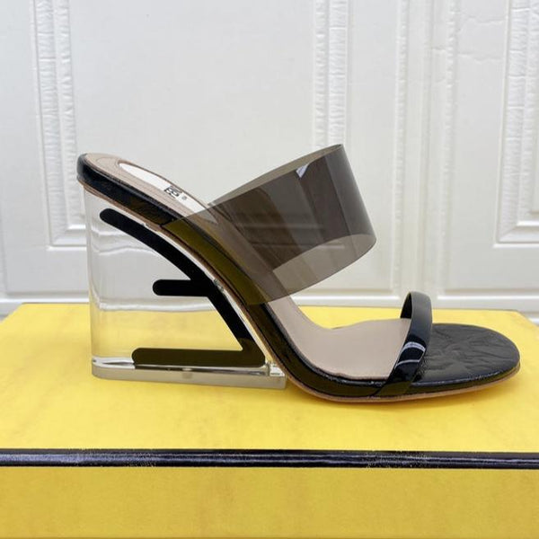 FENDI FIRST 95 MM HIGH-HEELED SANDAL IN BLACK TPU FILM AND LAMBSKIN