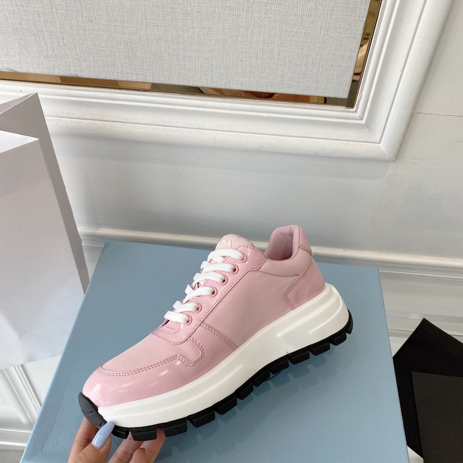 PRADA 25S THICK SOLE SNEAKER IN LIGHT PINK CALFSKIN AND CANVAS