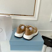 PRADA 25S THICK SOLE SNEAKER IN BROWN CALFSKIN AND CANVAS