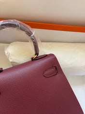 KELLY MINI 20 BAG IN GARNET RED CALFSKIN WITH GOLD HARDWARE