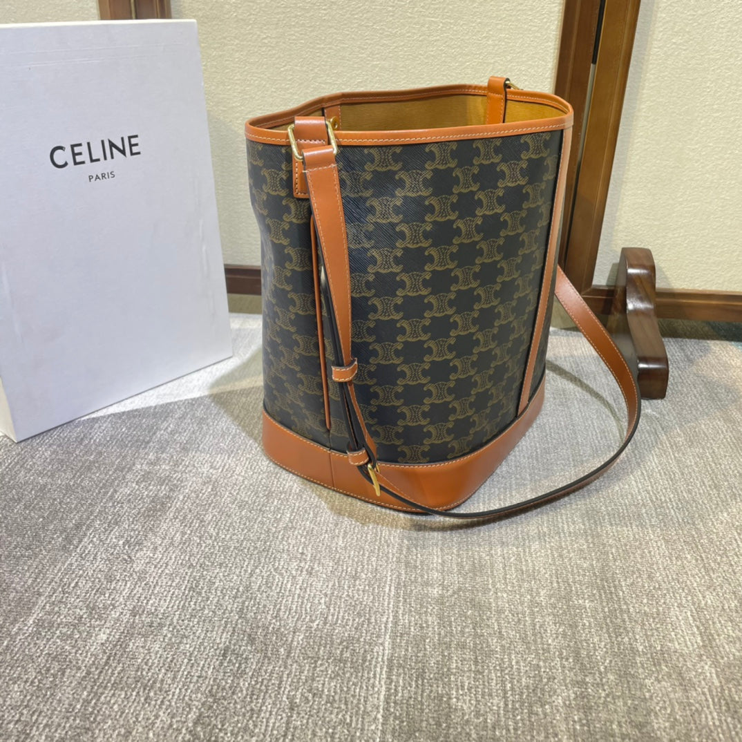 BUCKET 33 IN BLACK TRIOMPHE CANVAS AND BRONZE BROWN CALFSKIN TRIM