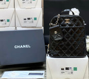 CHANEL 25S BACKPACK 23 IN BLACK SHINY CALFSKIN GOLD HARDWARE