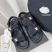 CHANEL 26S SANDALS IN BLACK FABRIC WITH PEARL-EMBELLISHED LOGO