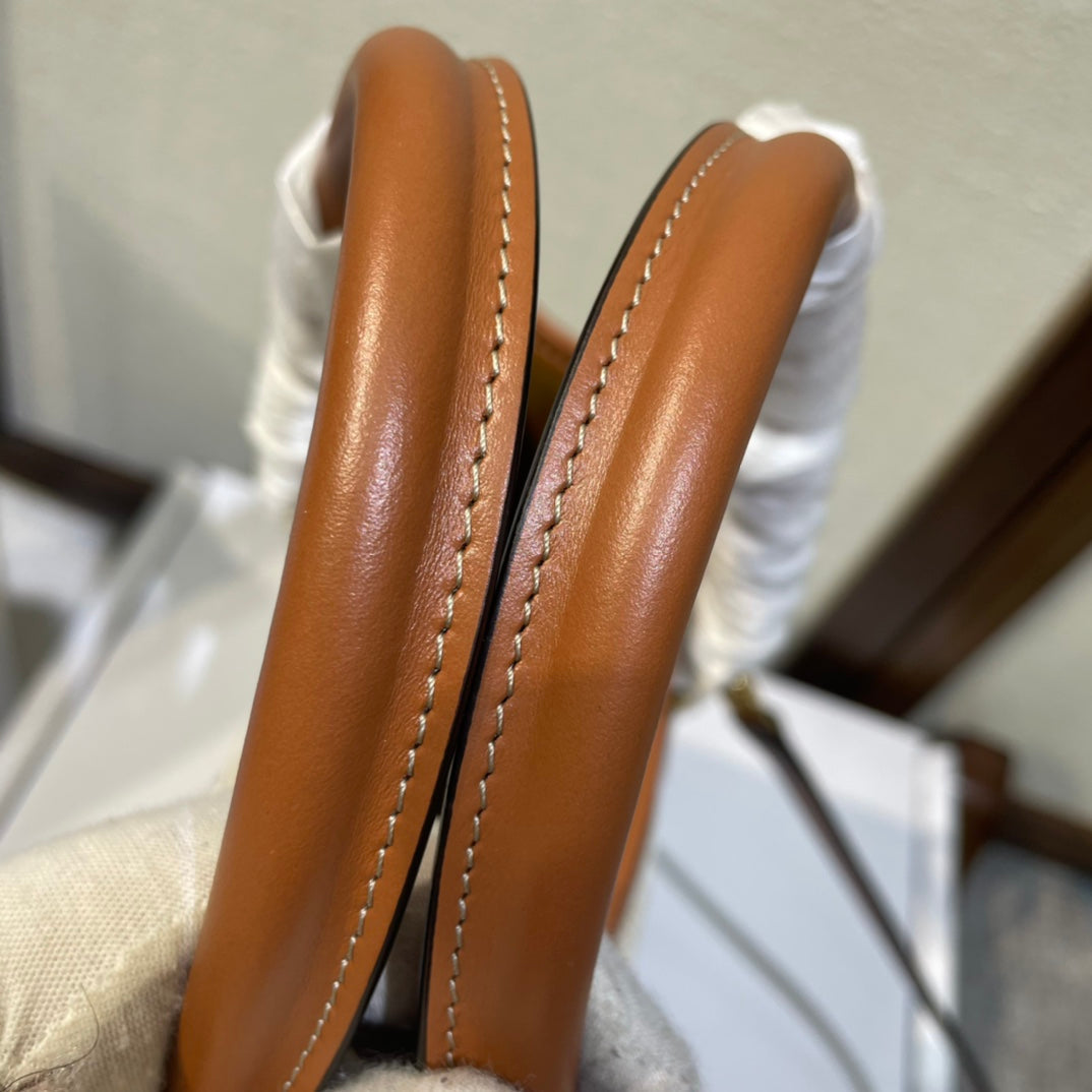 CELINE 25S HORIZONTAL CABAS 34MM IN WHITE TRIOMPHE CANVAS AND BROWN CALFSKIN