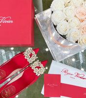 EFFLORESCENCE POINTED-TOE PUMPS IN RED SATIN WITH CRYSTAL BUCKLE