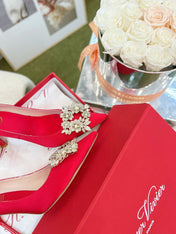 EFFLORESCENCE POINTED-TOE PUMPS IN RED SATIN WITH CRYSTAL BUCKLE