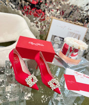 EFFLORESCENCE POINTED-TOE PUMPS IN RED SATIN WITH CRYSTAL BUCKLE