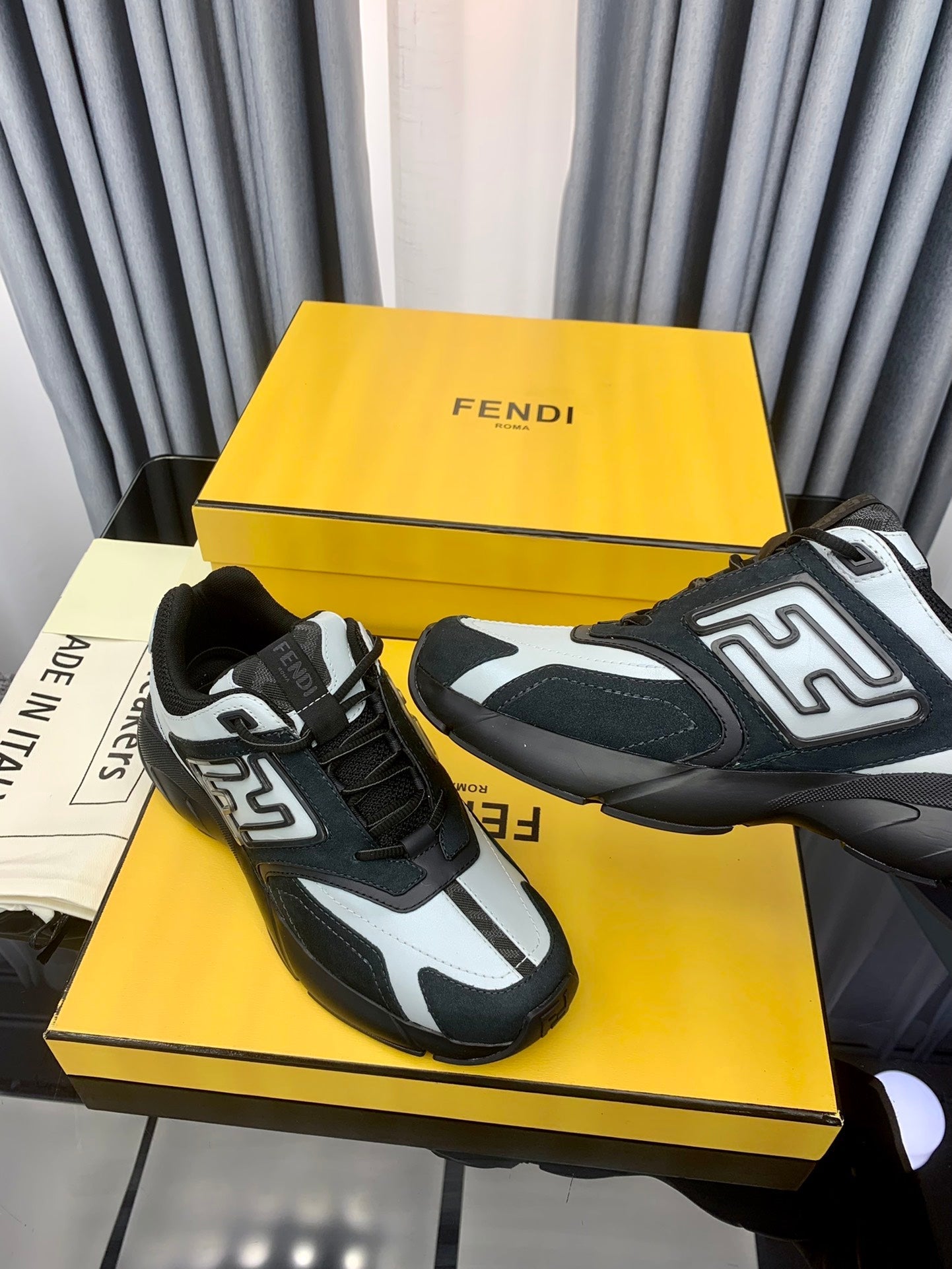 FENDI FASTER TRAINER IN BLACK SUEDE MIX WHITE CALFSKIN