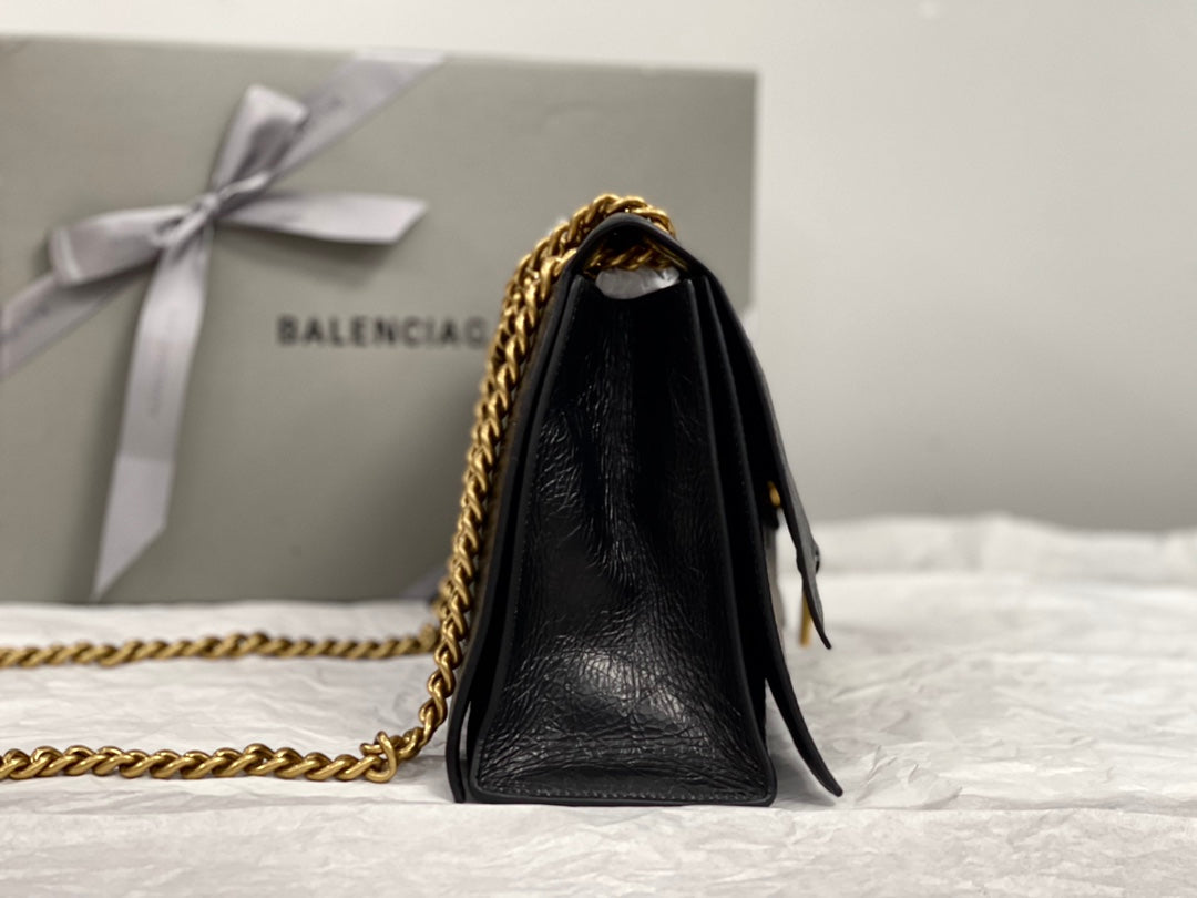 CRUSH MEDIUM CHAIN BAG 31 IN BLACK CRUSHED CALFSKIN GOLD HARDWARE