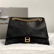 CRUSH MEDIUM CHAIN BAG 31 IN BLACK CRUSHED CALFSKIN GOLD HARDWARE