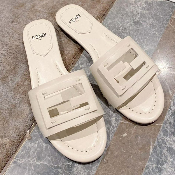 FENDI BAGUETTE SLIDES IN WHITE LAMBSKIN