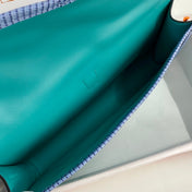 JIGE ELAN 29 CLUTCH IN TEAL GREEN CALFSKIN WITH ROYAL BLUE LIZARD SKIN