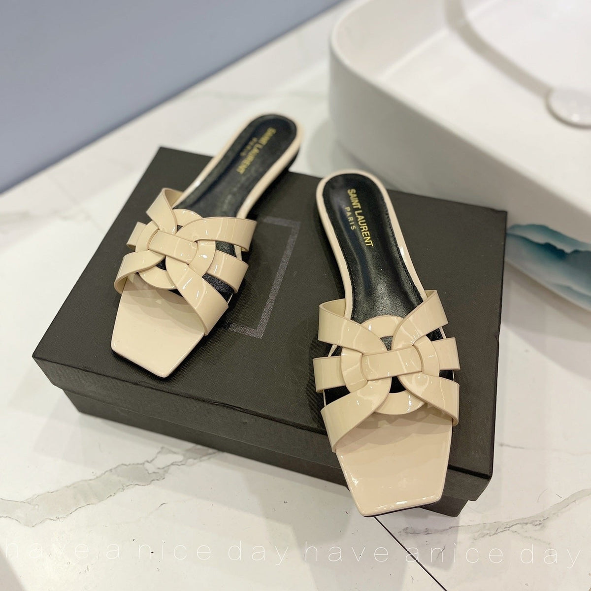 SL TRIBUTE SLIPPERS GLOSSY PASTEL YELLOW CALFSKIN