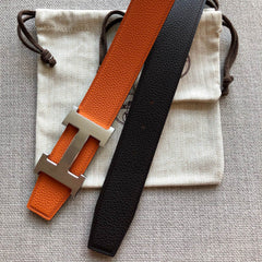 HM BELT BUCKLE & REVERSIBLE BLACK AND ORANGE LEATHER STRAP 38MM SILVER HARDWARE