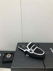 HALF-MULES IN BLACK WOOL WOVEN
