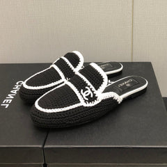 HALF-MULES IN BLACK WOOL WOVEN