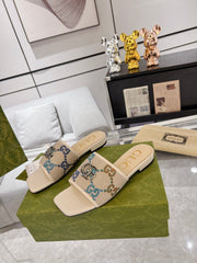 GG EXCLUSIVE SLIDE SANDAL IVORY SEDGE WITH NAVY PATTERN