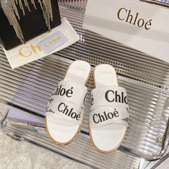 WOODY SLIPPER IN WHITE MIX BLACK CANVAS