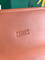 SAINT LÉGER BACKPACK 35 IN BROWN GOYARDINE CANVAS AND CALFSKIN WITH CARTOON PATCH